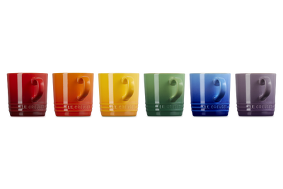 Set of six colorful mugs with a brand logo on a white background