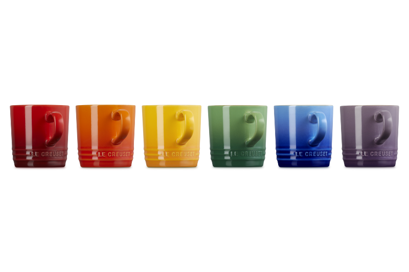 Set of six colorful mugs with a brand logo on a white background