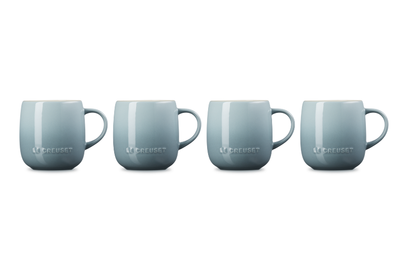 Four light blue mugs with &