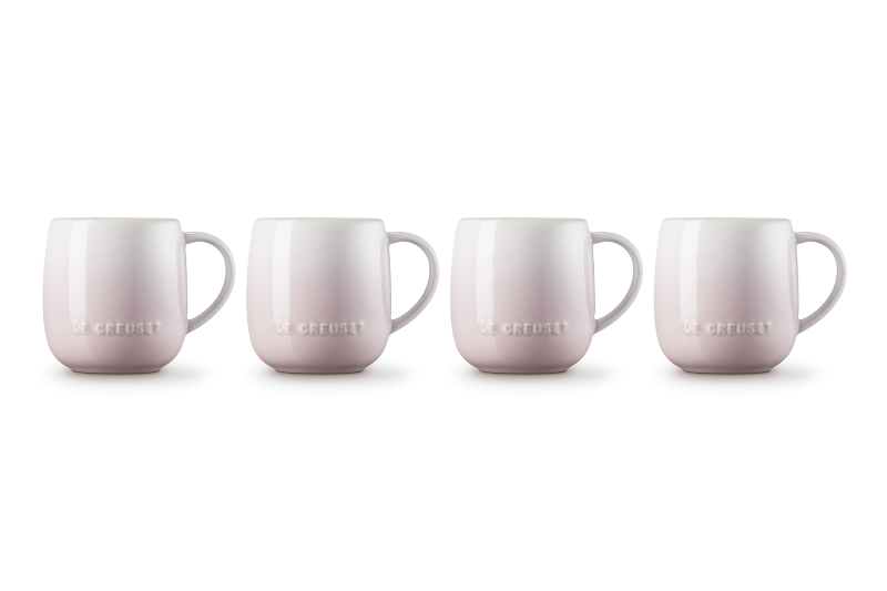 Four pink mugs with &