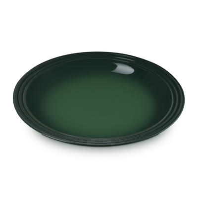 Green ceramic plate on a white background