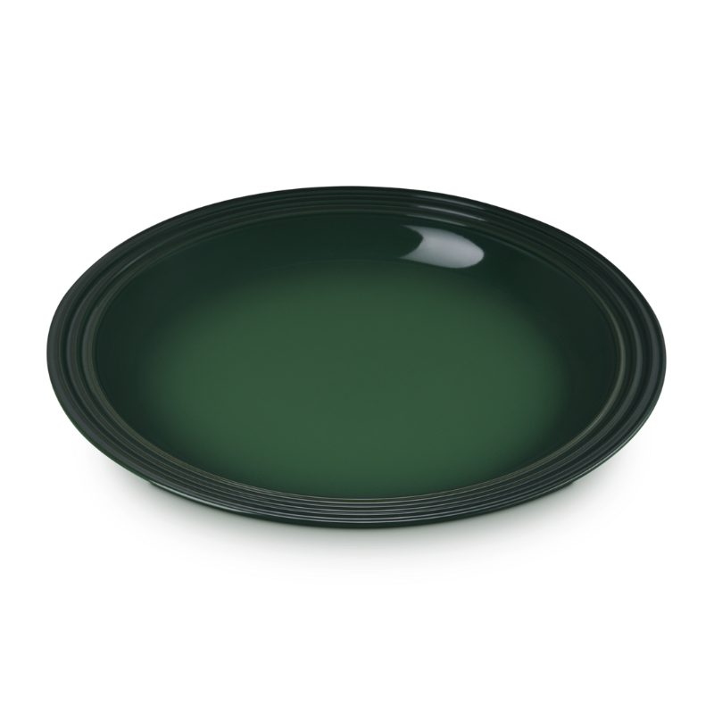 Green ceramic plate on a white background