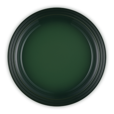 Dark green circular object on a white background