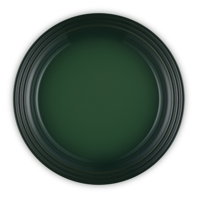 Dark green circular object on a white background