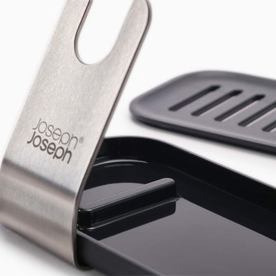 Metallic kitchen tool with 'Joseph Joseph' branding on a white background