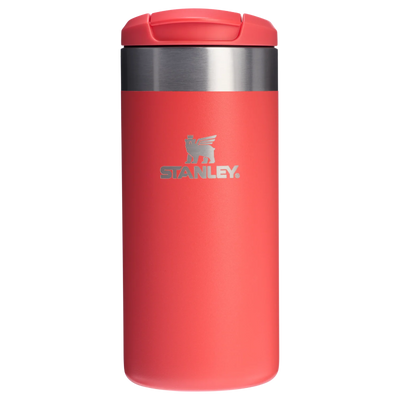 Red Stanley travel mug with a silver lid on a white background