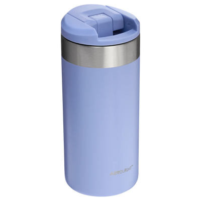 Light blue travel mug with a silver rim on a white background