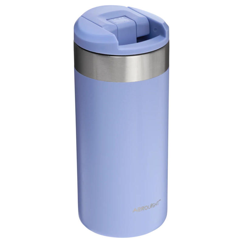 Light blue travel mug with a silver rim on a white background