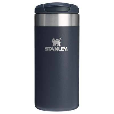 Blue Stanley tumbler on a white background
