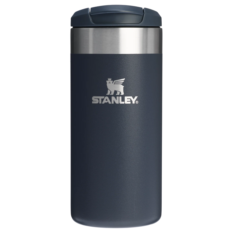 Blue Stanley tumbler on a white background