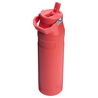 Red water bottle with a straw on a white background